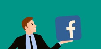 An animation of a man holding Facebook
