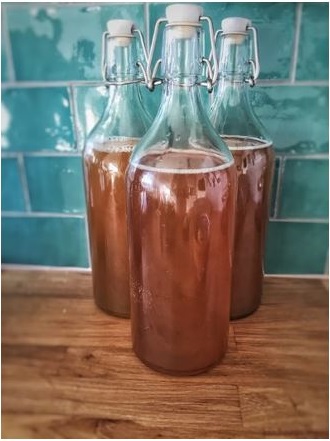 Fermented tomatoes in glass bottles