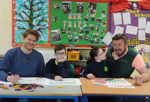 Pictured children from the Phoenix Park School and Matt Swain (left) principal and Dominic O'Donohoe, garden designer Sanctuary Synthetics