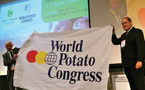 The World Potato Congress flag handover ceremony took place in Cusco, Peru when Juan Jose Risi (Vice-minister for Agriculture and Irrigation, Peru), presented The WPC flag to Liam Glennon, (Chairperson of The 2021 World Potato Congress Organising Committee) in Cusco, on 29 May 2018.