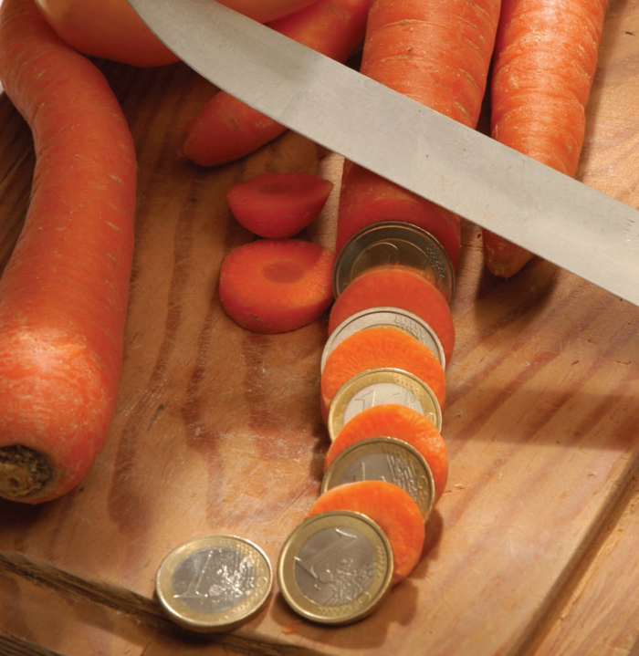 A sliced carrot into money. PHOTO BY COMUGNERO SILVANA