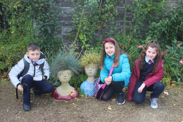 Pictured (L-R) are students Karl Cummins, Caitlin Dooley and Zoey Doyle who found some crazy haired gardeners on the grounds. The students got to explore the gardens, dig in to a planting workshop, and receive new seeds to bring back to their school. The school also received a sun bubble greenhouse for their own school garden as part of their 2019 Incredible Edibles prize. Visit www.incredibleedibles.ie to register today!