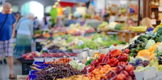 An image of fruits and vegetables in a market